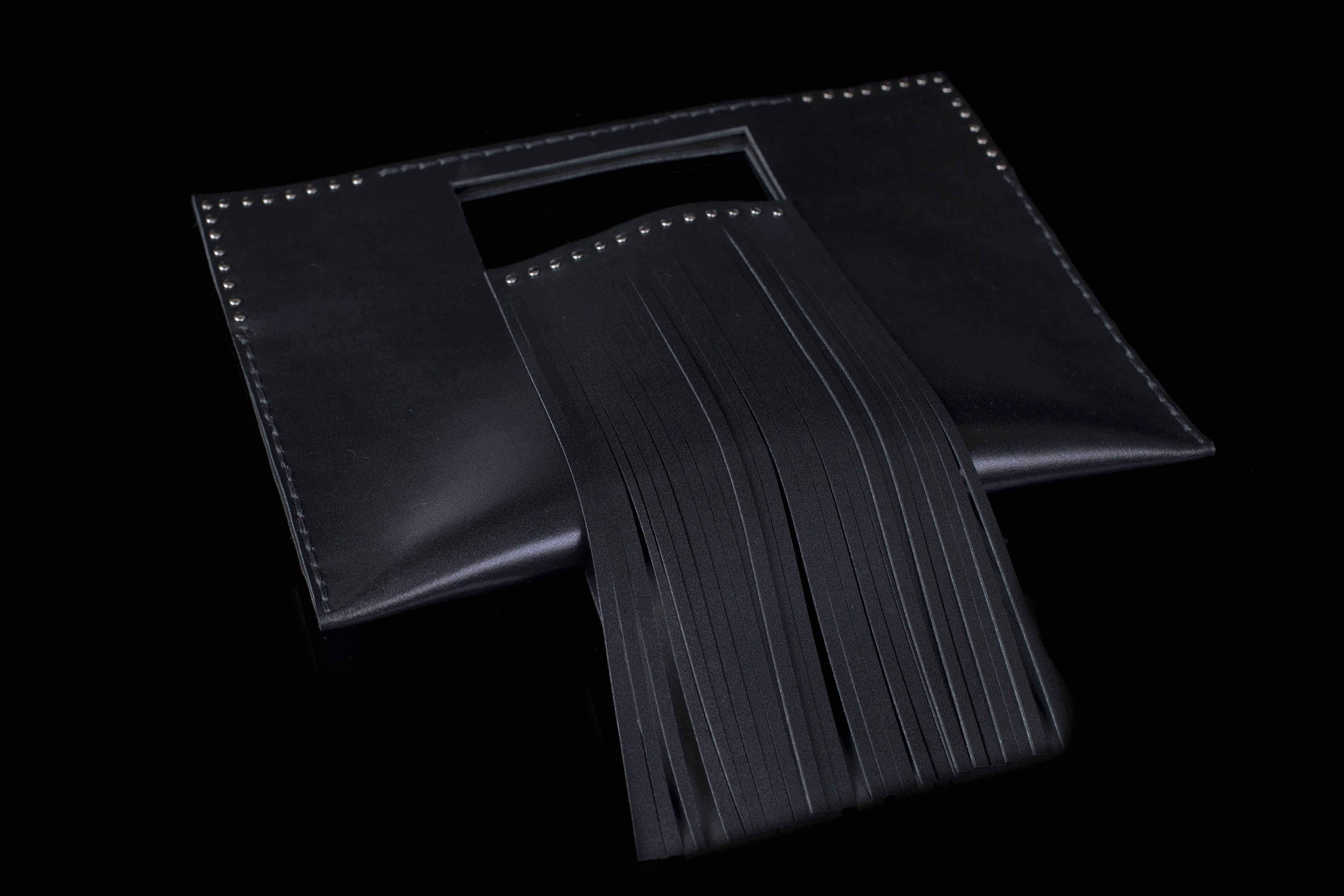 The Fringe Black Clutch Bag